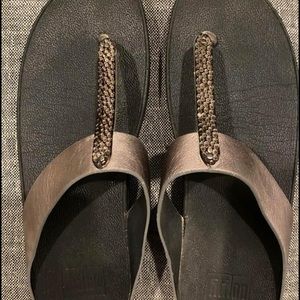 Women’s size 10 FitFlop black with silver strap.